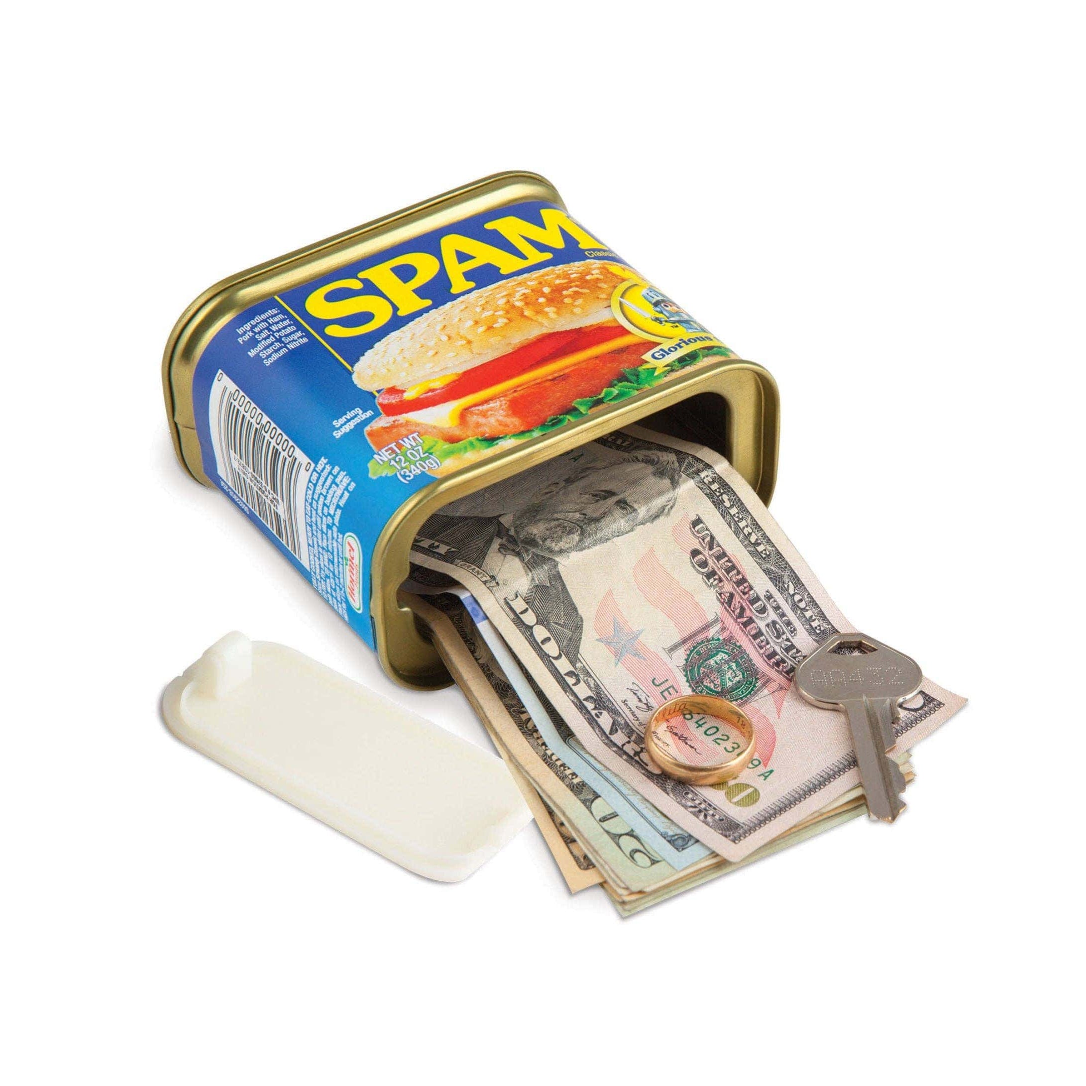 A Spam can with its lid open, revealing stacked US currency and a key inside. The setup suggests clever concealment, adding a humorous, unexpected twist.