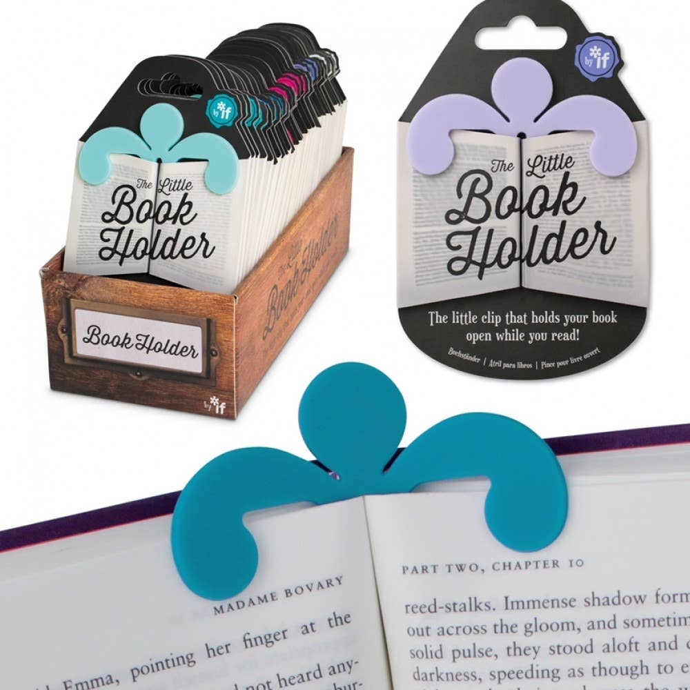 A colorful book holder clip is shown in use, holding a book open. The package has decorative designs and text reading "The Little Book Holder." Display box is visible.