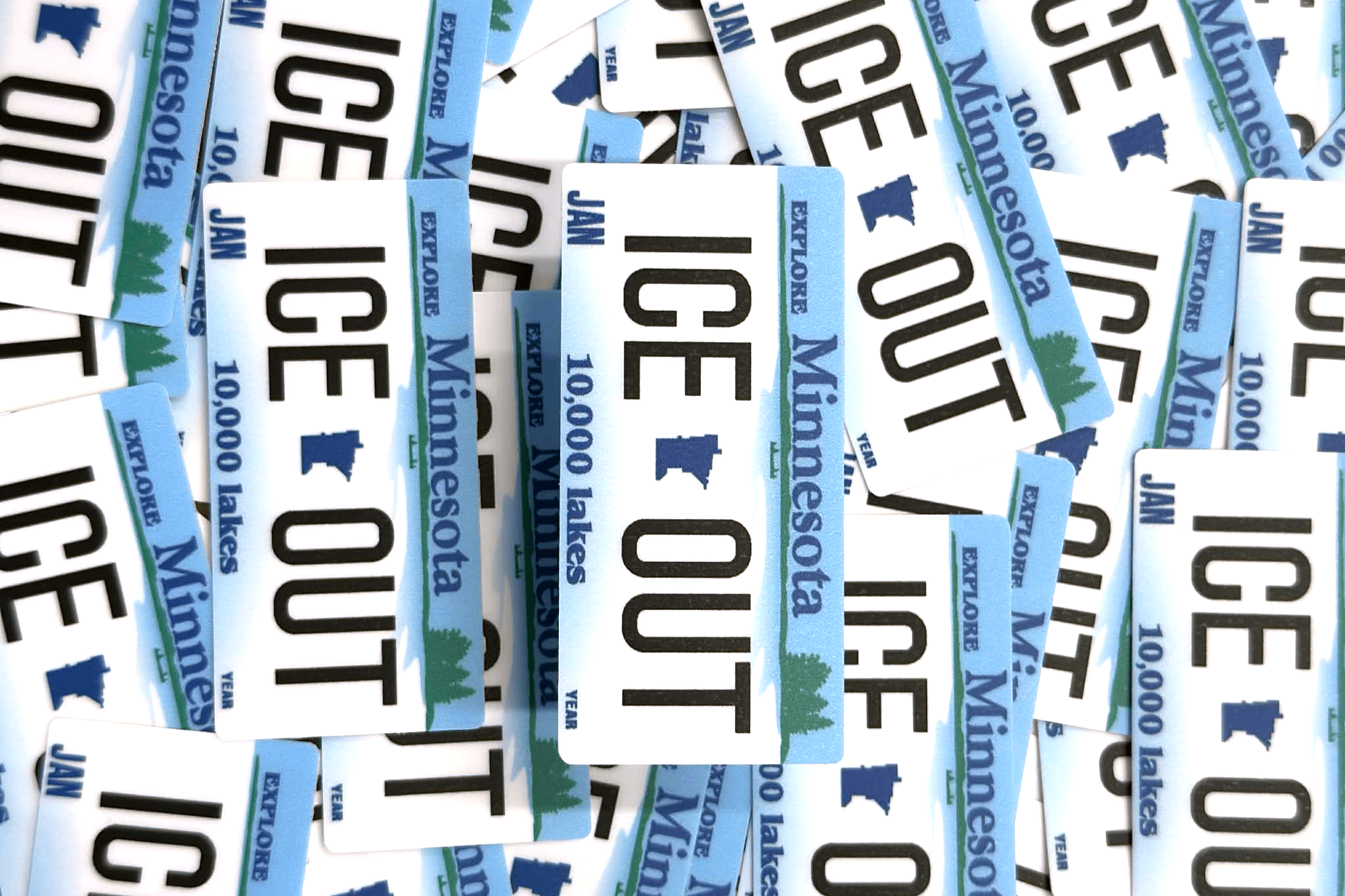 Collection of 'ICE OUT'Minnesota ice fishing license stickers.