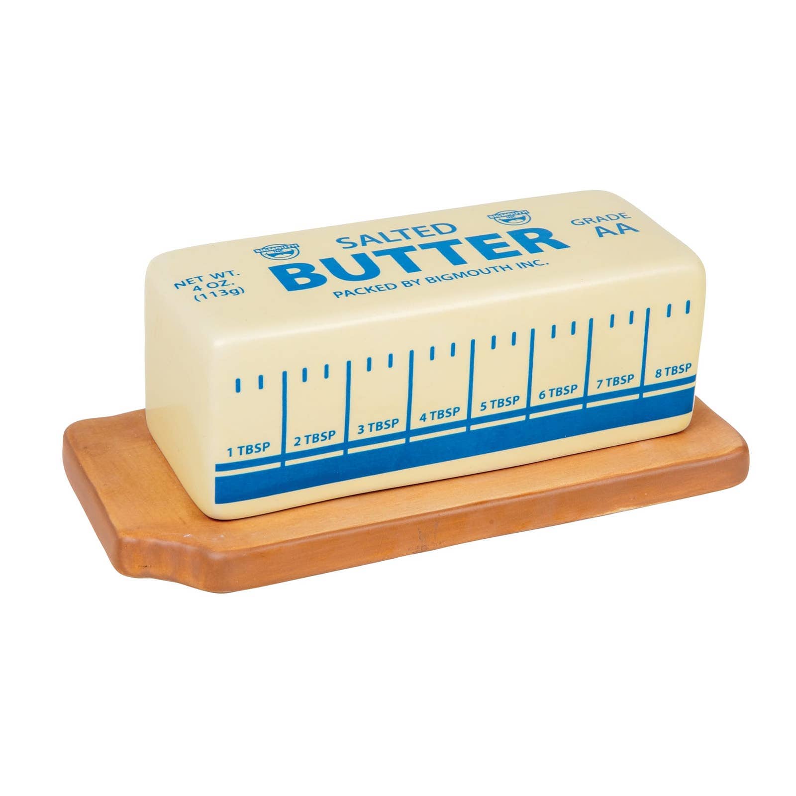 A butter-shaped stick resting on a wooden tray, labeled with blue text and measurements in tablespoons, mimicking packaging design, evokes humor.