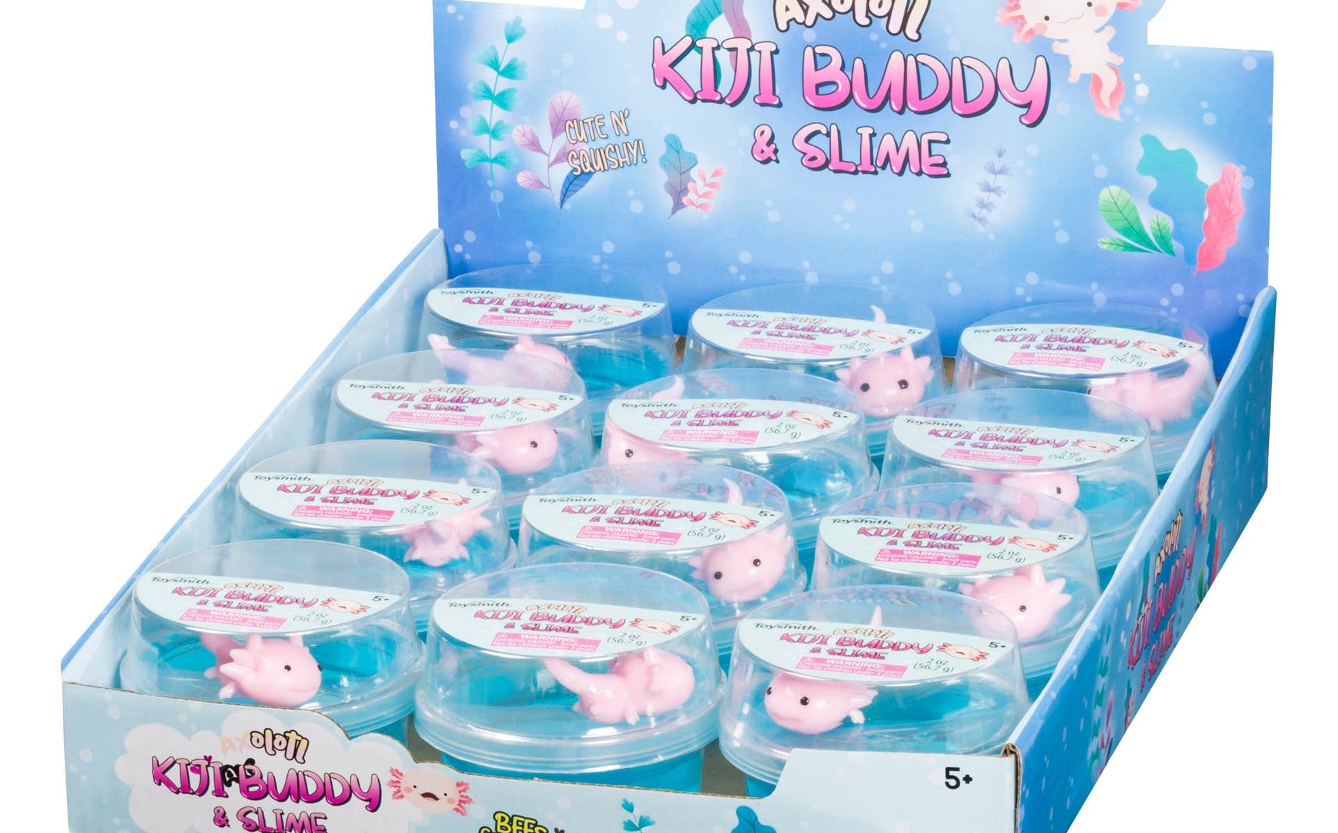 Display of "Axolotl Kiji Buddy & Slime" toys in a blue box. Each container has a cute pink axolotl in clear slime. Packaging is colorful and playful.