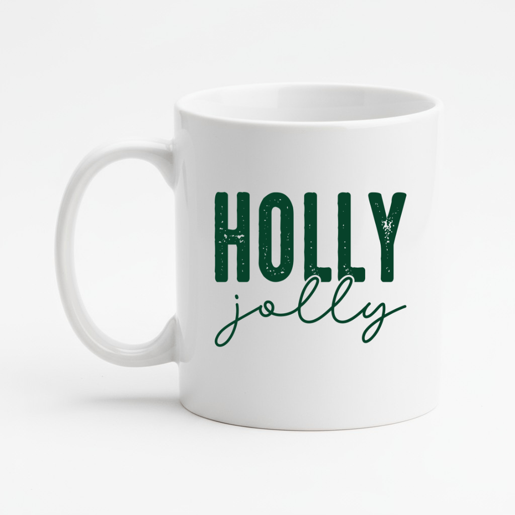 White mug with 'Holly jolly' text in green on a white background
