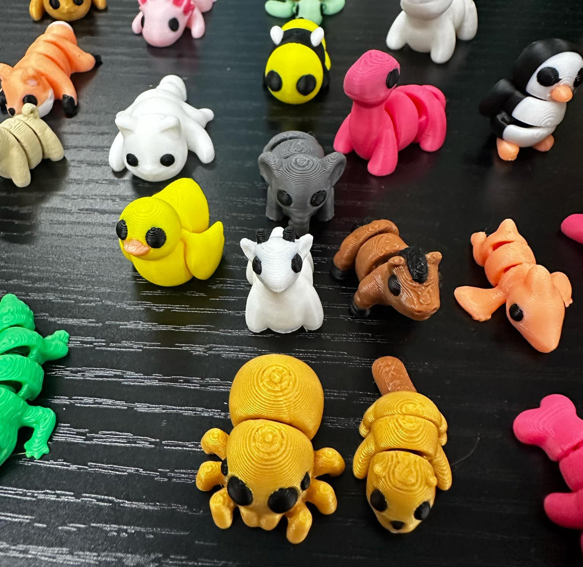 Tiny little fidget pets in a variety of colors and styles