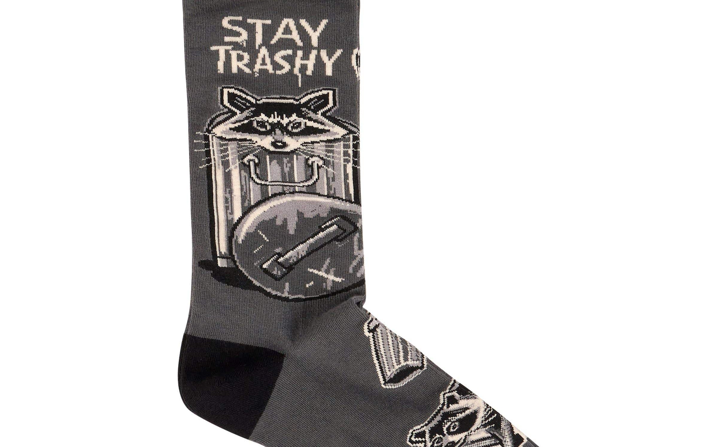 Gray sock with raccoon design and 'Stay Trashy' text on a white background