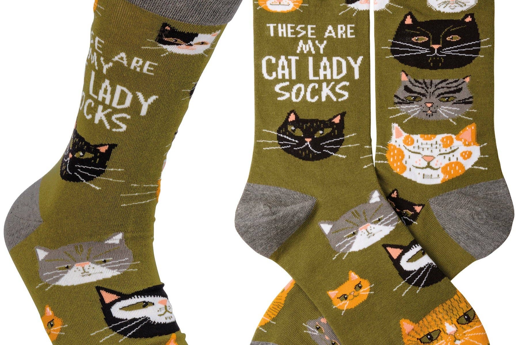 Pair of socks with cat illustrations and text on a white background