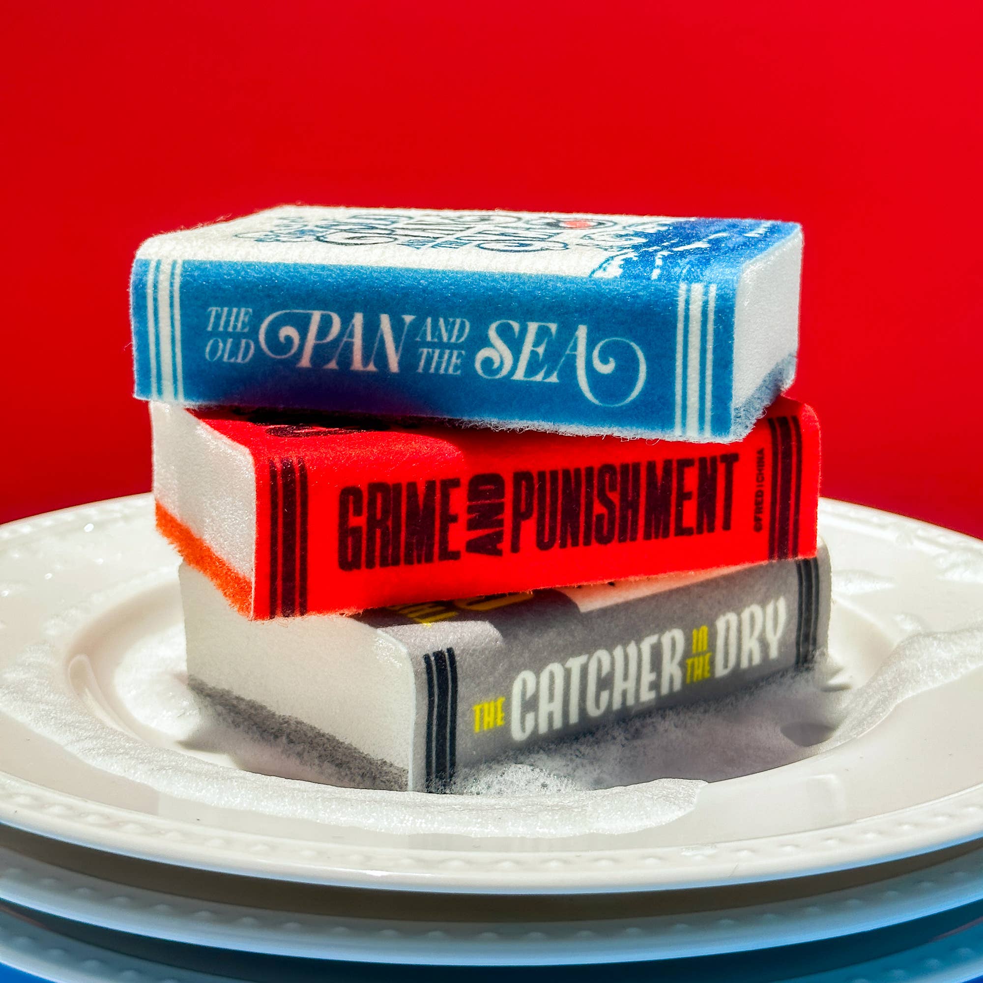Stack of books with a red background