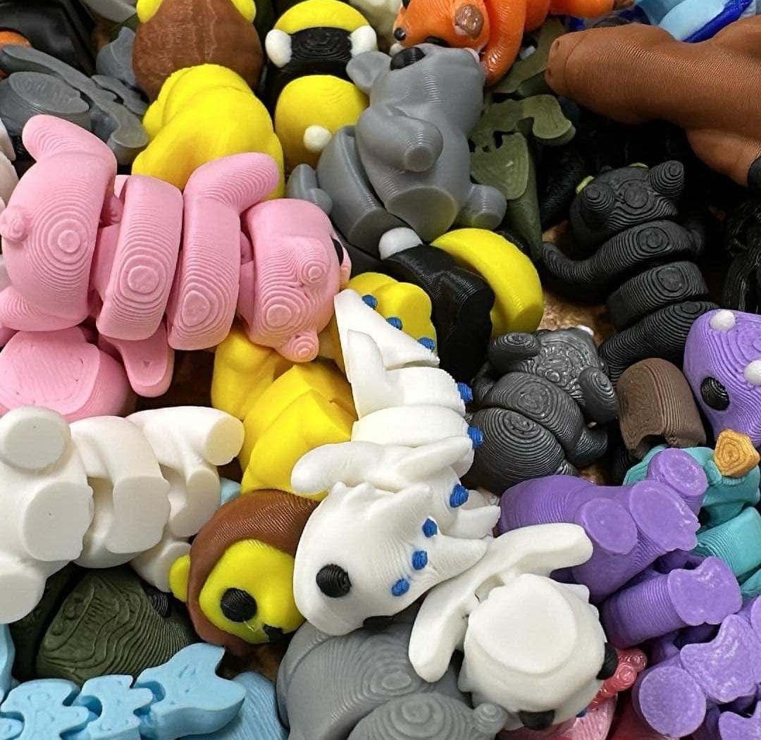 Tiny fidget pets in a variety of colors and styles