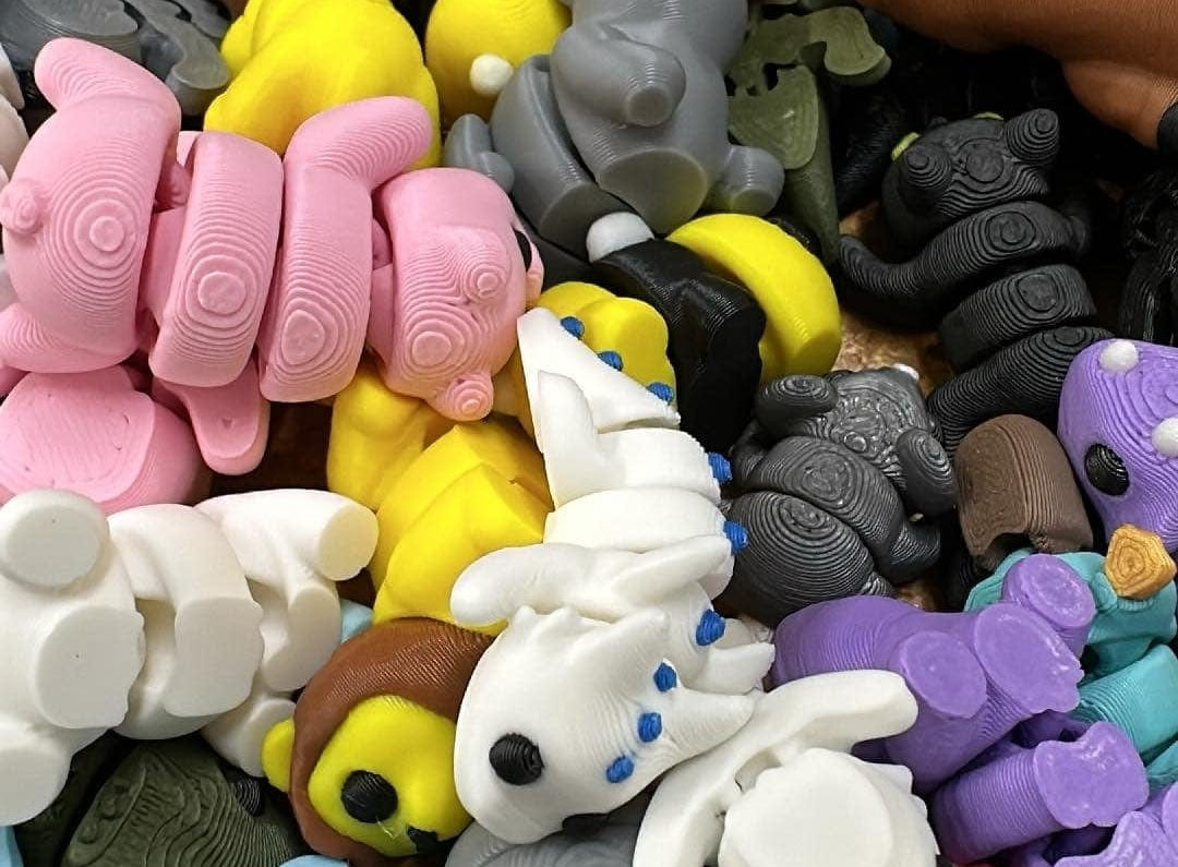 Tiny fidget pets in a variety of colors and styles