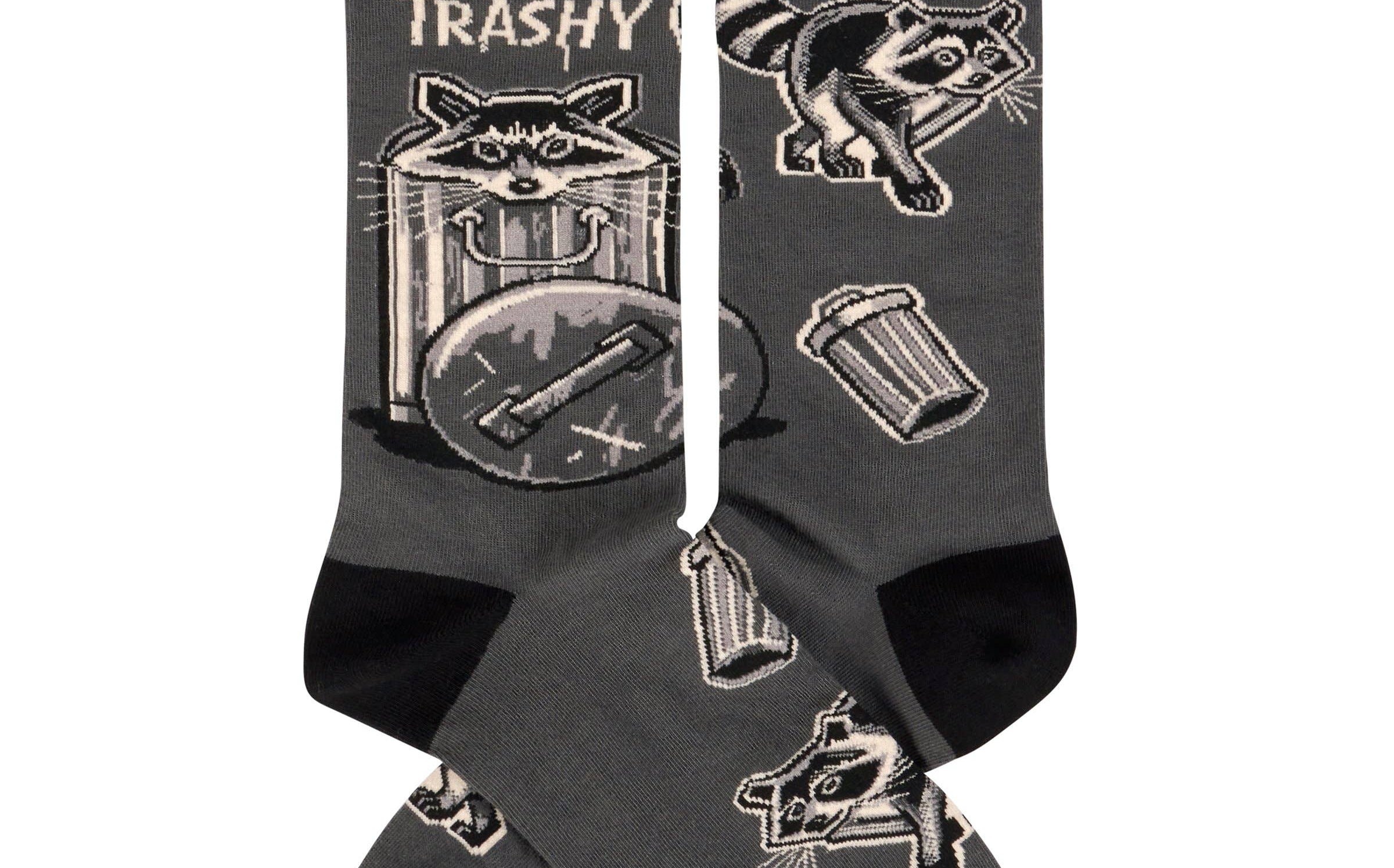 Black socks with raccoon illustrations and 'Stay Trashy' text on a white background