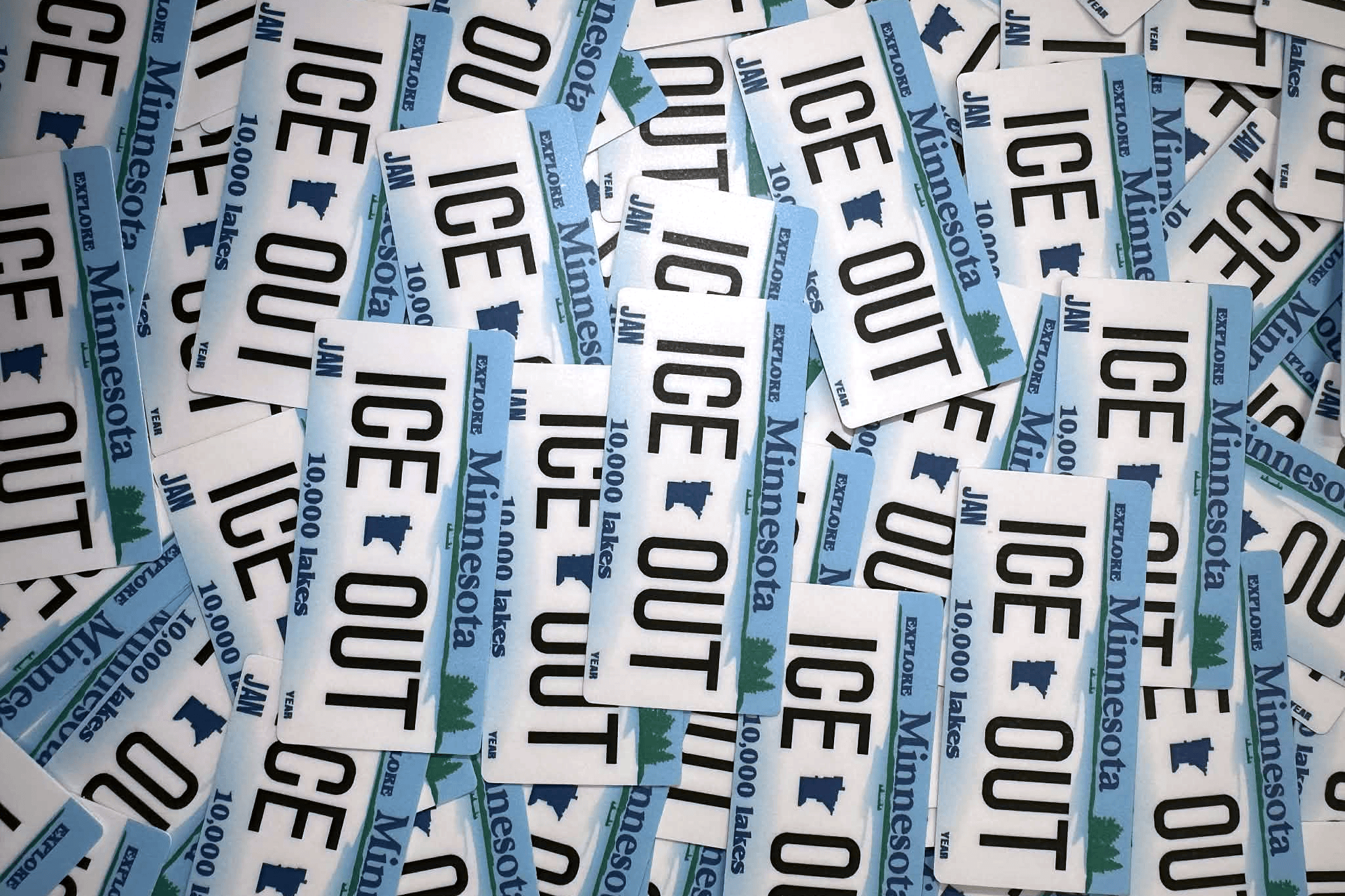Multiple 'Ice Out'Minnesota fishing licenses stacked together