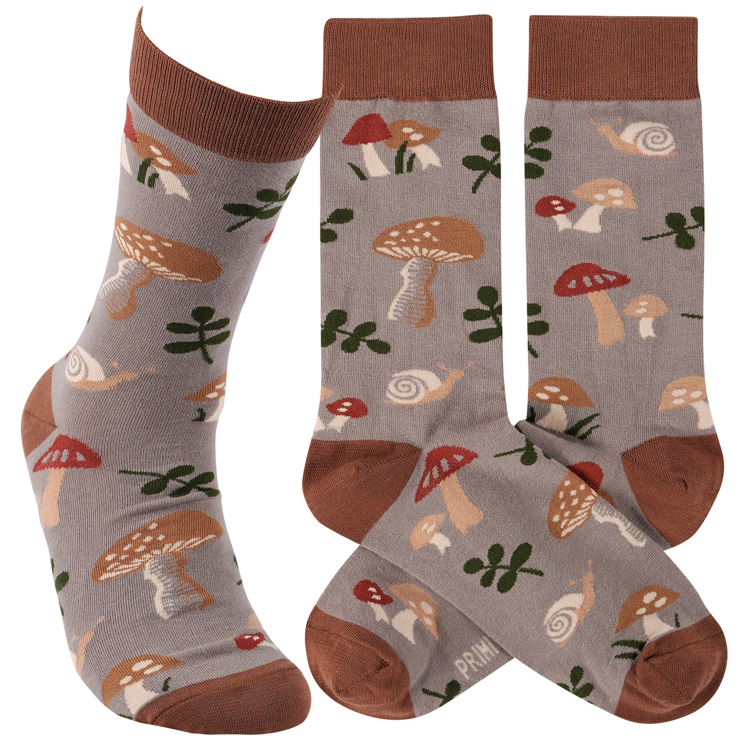 Gray socks adorned with red and brown mushrooms, snails, and green leaves. Brown cuffs, heels, and toes add contrast, creating a whimsical forest theme.