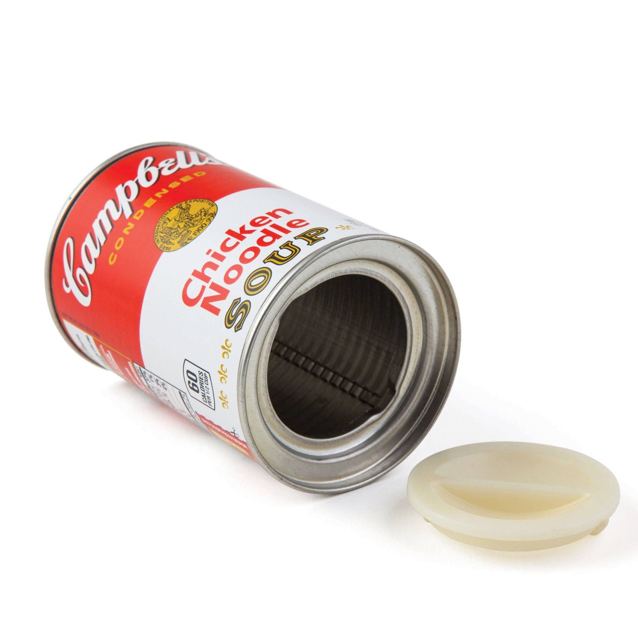 Open Campbell’s chicken noodle soup can with a detached lid on a white background. The can is laid on its side, conveying an iconic pop-art feel.