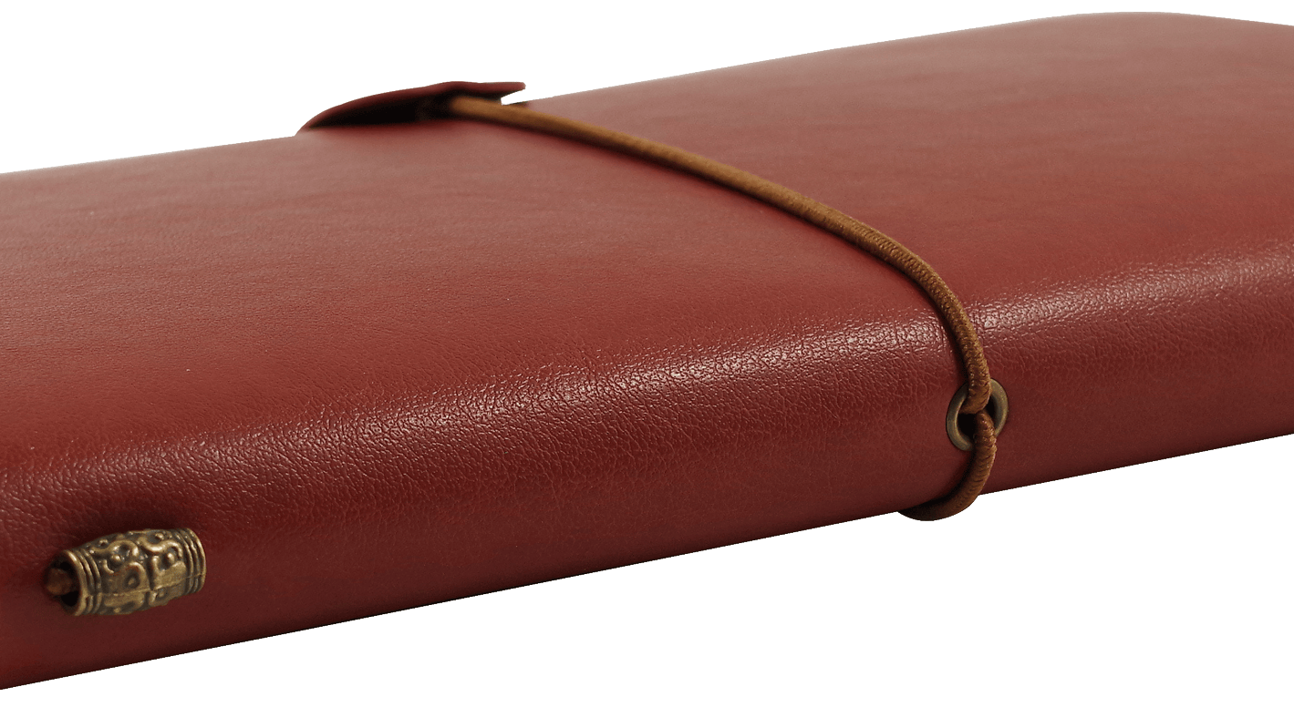 A closed brown leather journal with a wrap-around cord, laying on a transparent background; evokes a sense of adventure and nostalgia.