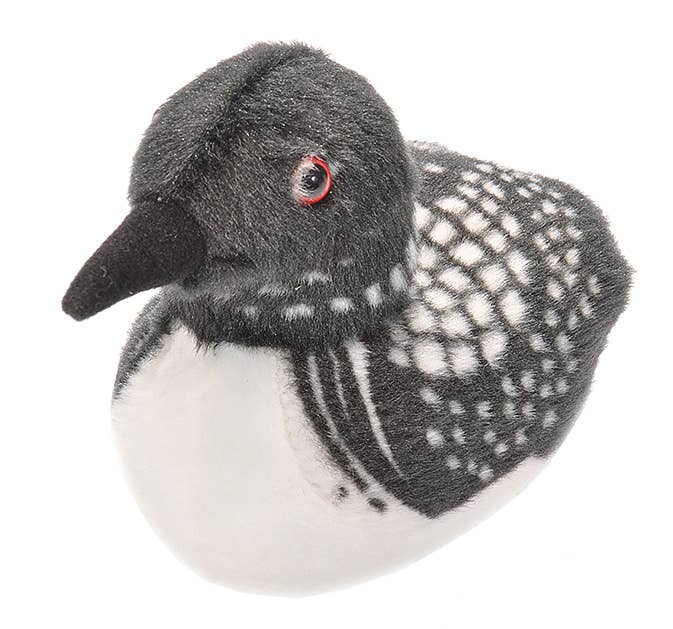 A plush toy resembling a loon is shown. It has black and white speckled feathers, a black beak, and red eyes, conveying a soft and cute appearance.