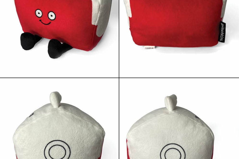 A set of four images showcasing a red and white cooler plush from different angles. The top left image displays the front, featuring black embroidered text on the white lid that reads, 'Don't hate me because I'm a little cooler,' with a smiling face on the red section and black legs sticking out from the bottom. The top right image shows the back of the plush. The bottom left and bottom right images highlight the sides of the cooler, each featuring two black circles on the white lid.