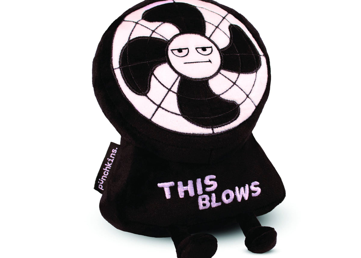 A plush toy designed to look like an annoyed electric fan with a black and white color scheme. The face of the fan has a grumpy expression, and the toy's base features the phrase 'THIS BLOWS' embroidered in bold, light-colored letters. It has small black legs and a tag on the side that reads 'punchkins.' The plush has a humorous and sarcastic design, making it a fun novelty item.