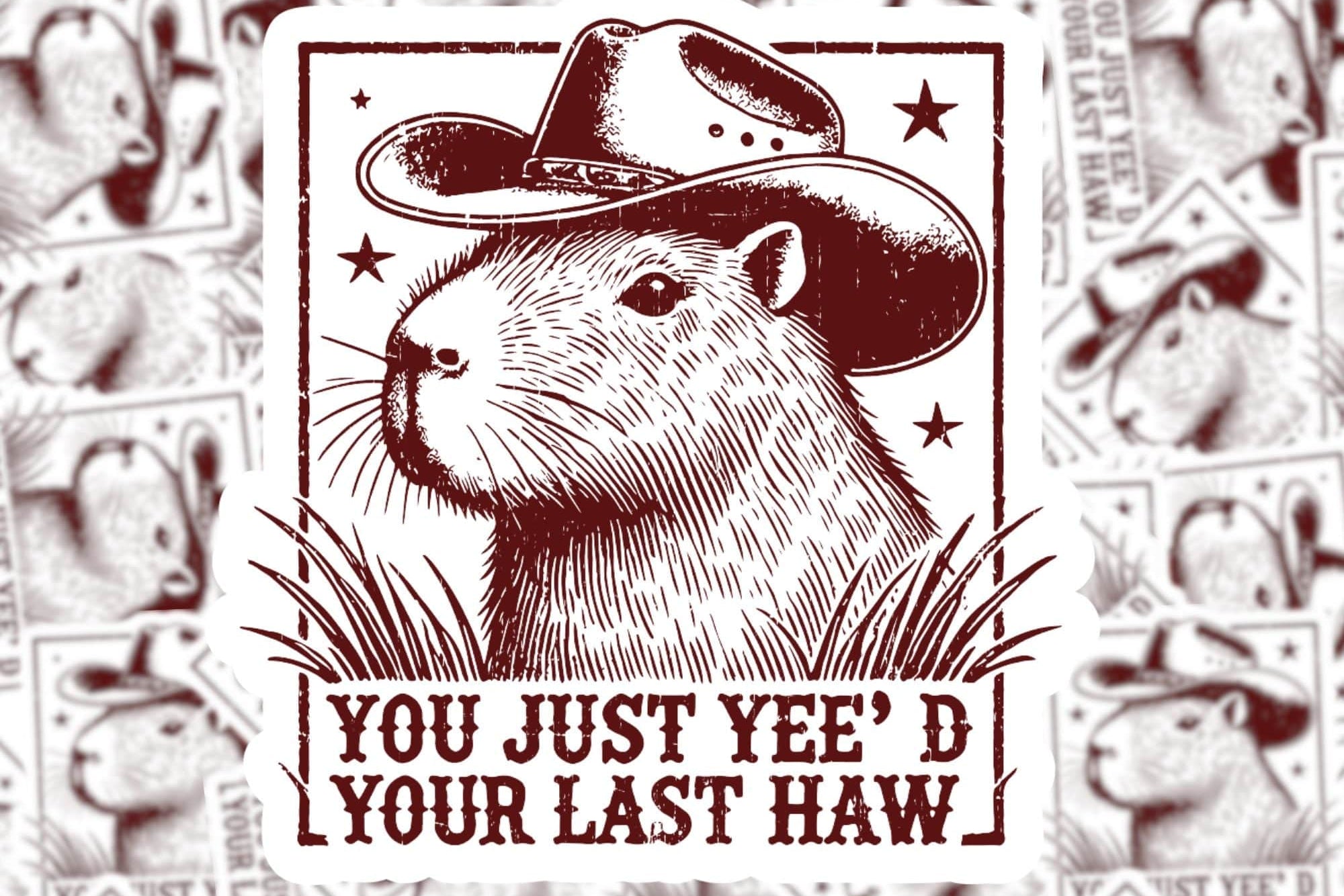 A sticker of a cartoon capybara wearing a cowboy hat with the text 'You just yee'd your last haw'.