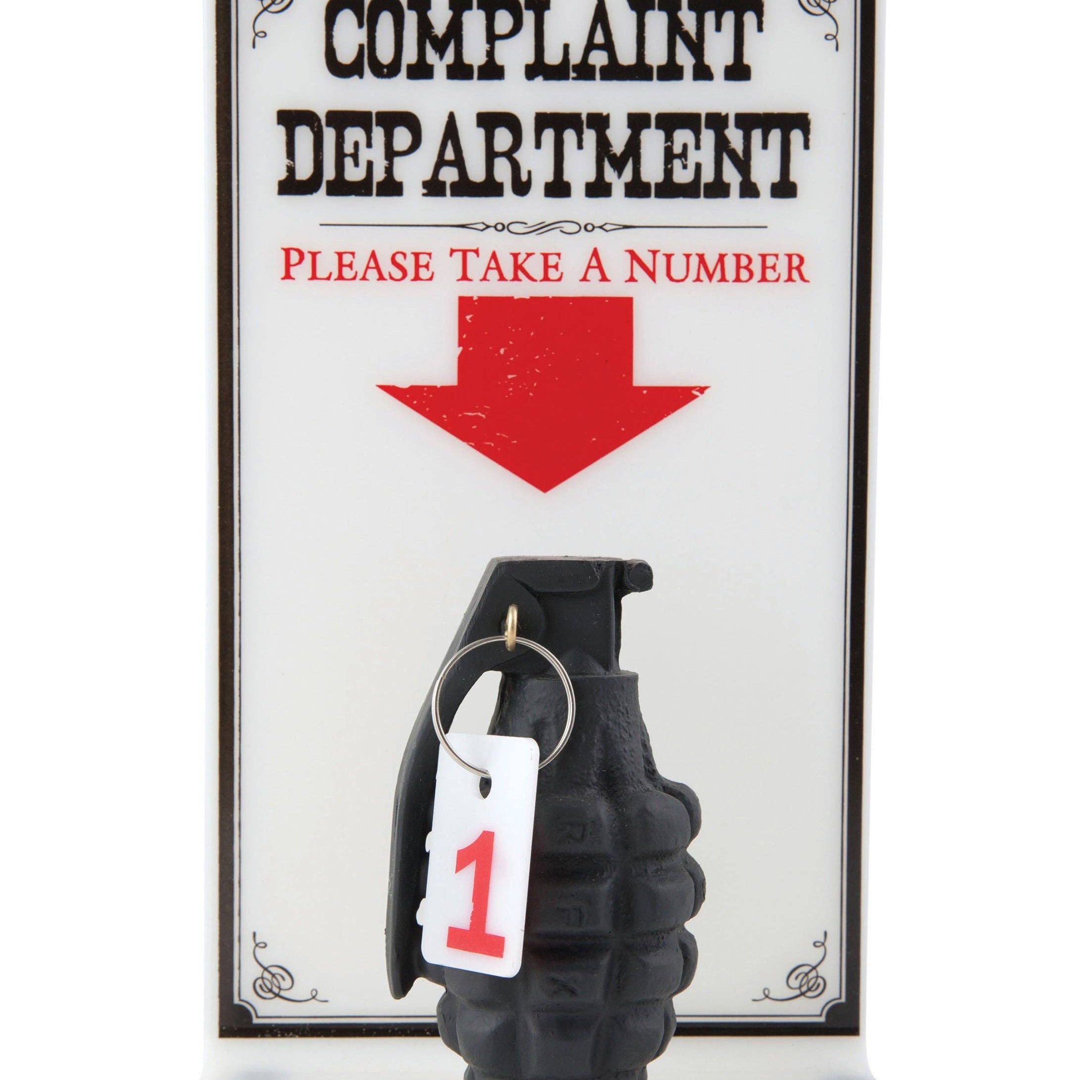A sign says "Complaint Department" with "Please Take a Number" in red below. An arrow points to a black grenade with a "1" tag attached, adding humor.