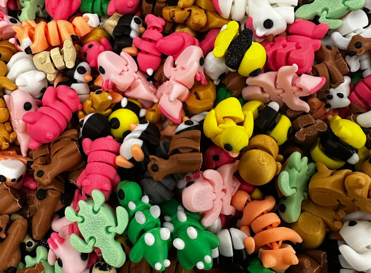 Tiny fidget pets in a variety of colors and styles