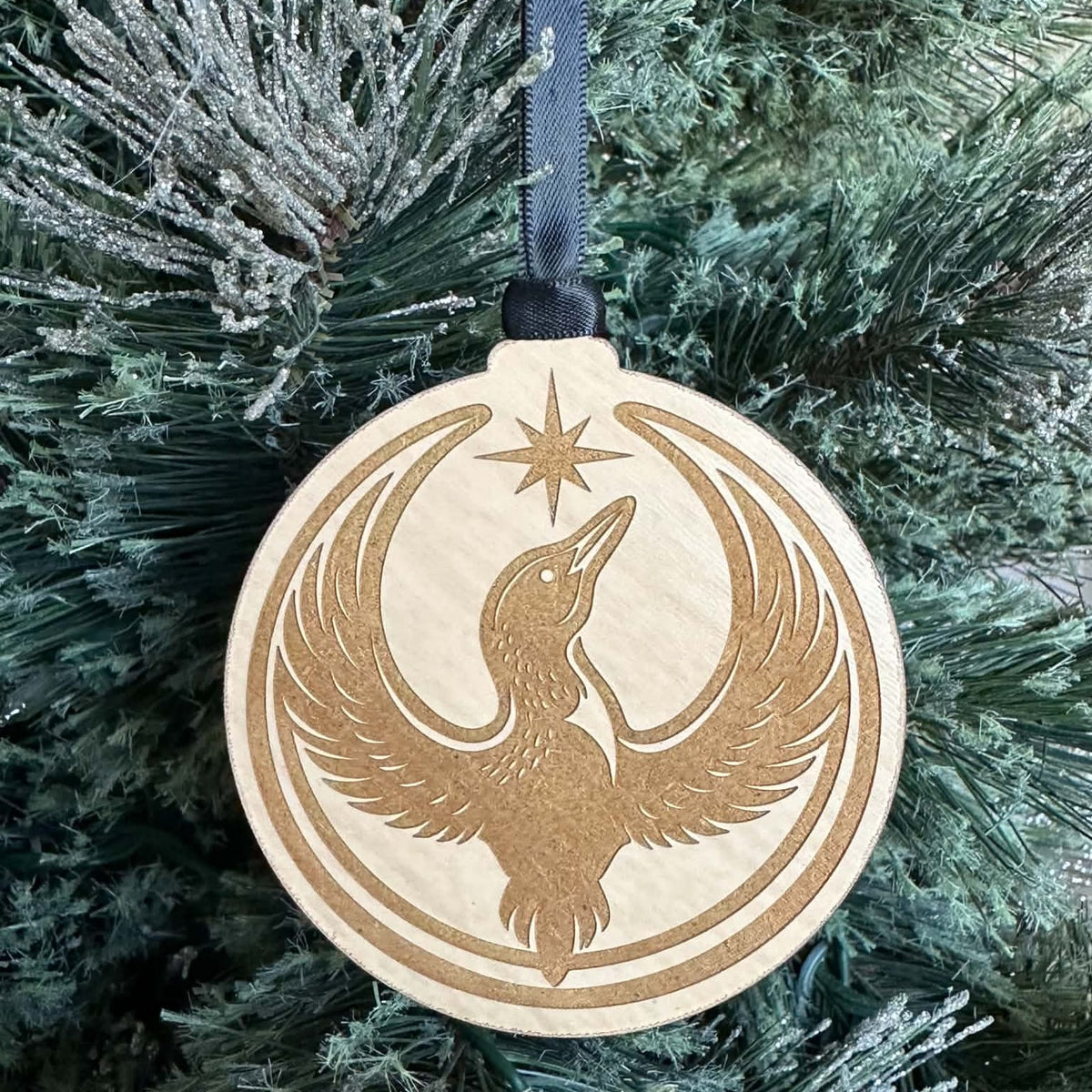 Front view of the Rebel Loon engraved wood Christmas ornament