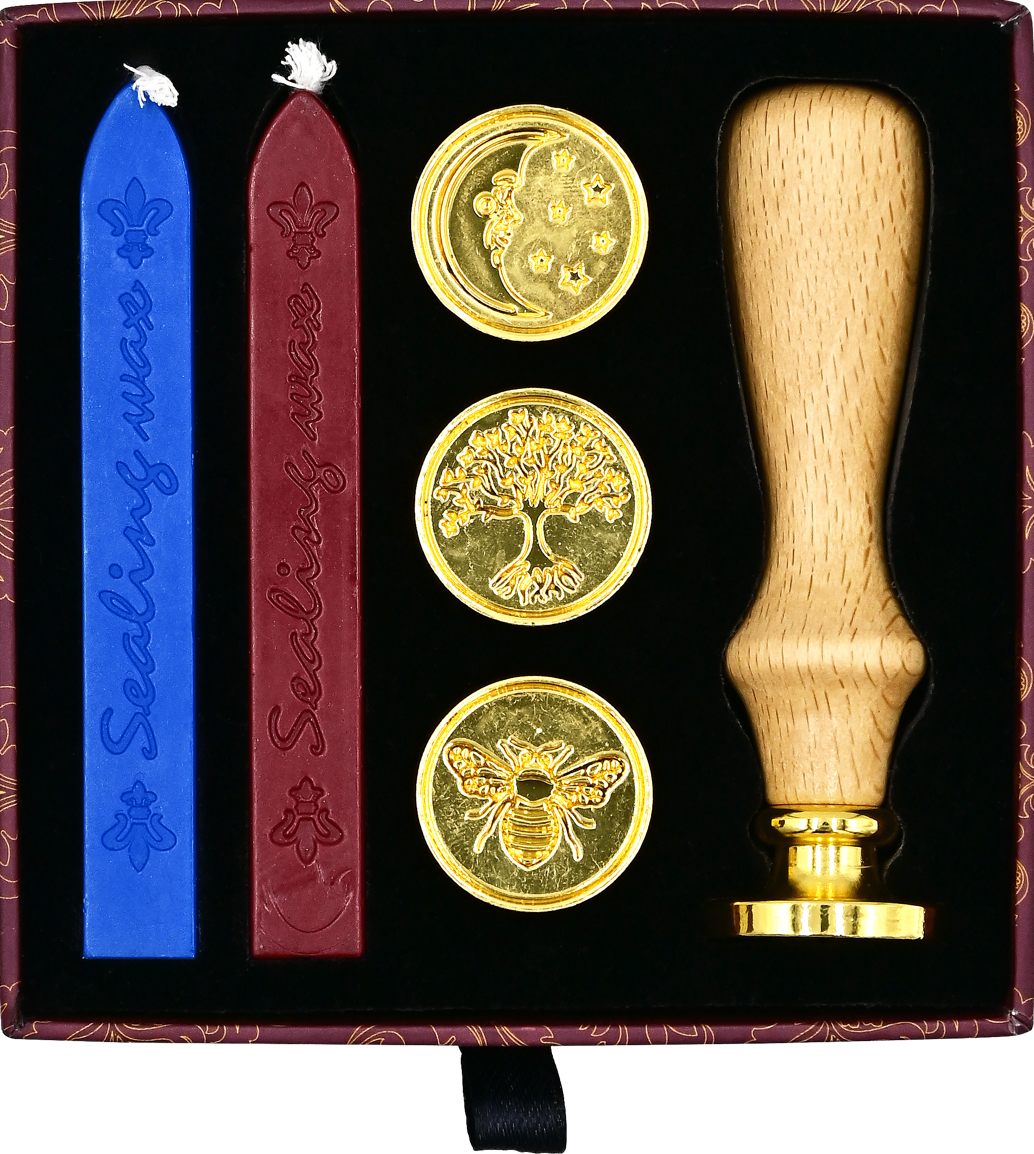 A sealing wax kit with a wooden stamp handle, two sticks of blue and red wax, and three gold-colored stamp heads featuring a moon, tree, and bee.