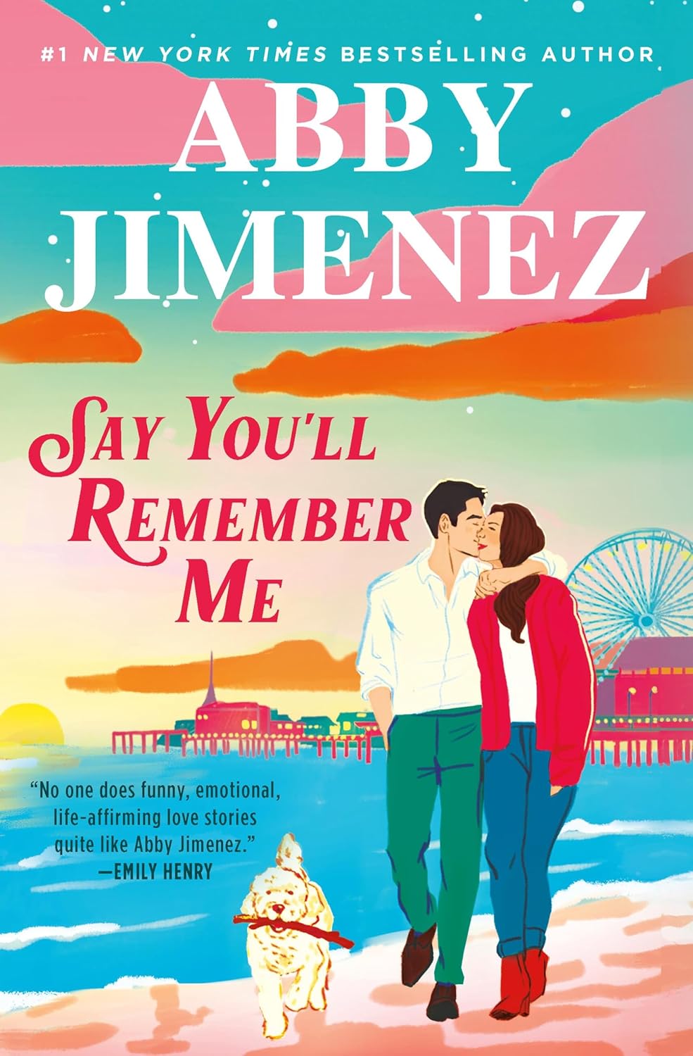 Book cover of 'Say You'll Remember Me' by Abby Jimenez with a couple and dog at a beach.