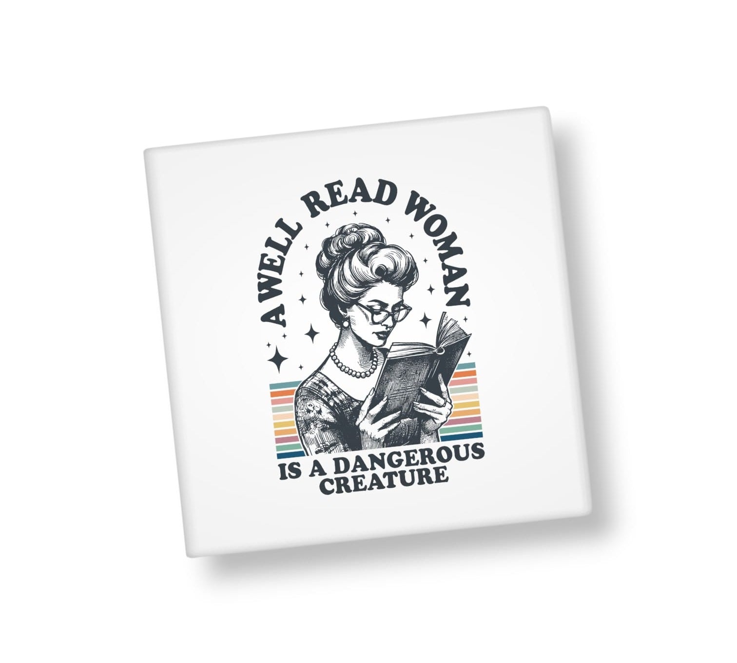 Square magnet with a graphic of a woman reading a book and text 'A well read woman is a dangerous creature' on a white background.