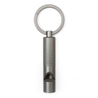 Metal keychain with textured design on a white background