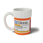 A white coffee mug designed like a prescription bottle. The label humorously details a coffee dose, with a playful tone, using medical jargon.