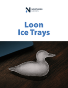 Loon-shaped ice cube on a dark wooden surface, beneath 'Northern Goods' logo and text 'Loon Ice Trays' in bold blue letters. Modern, playful tone.