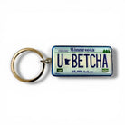 Keychain with a Minnesota license plate design featuring the text 'U BETCHA'.