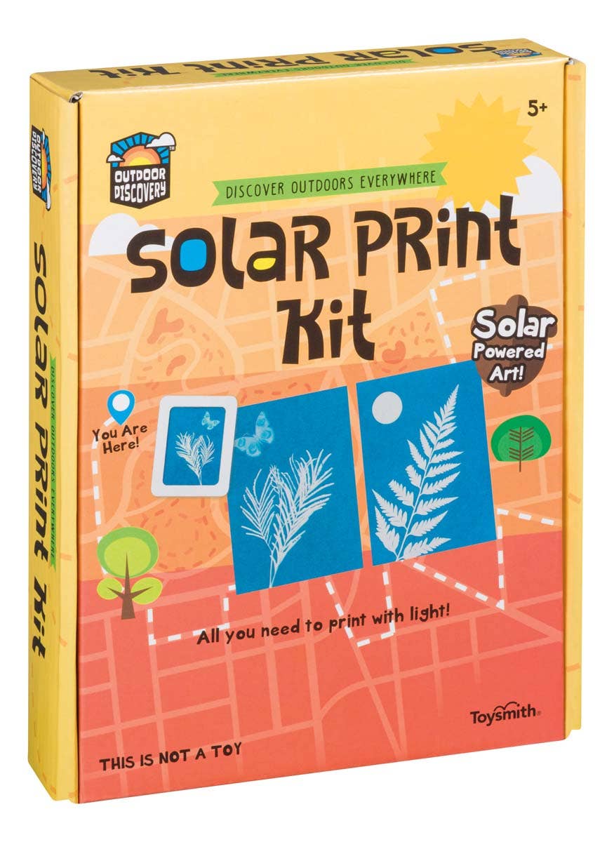 Yellow box with "Solar Print Kit" in bold letters. Includes blueprints of leaves and butterfly. Text highlights solar-powered art and outdoor discovery.