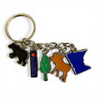 Keychain with bear, heart, tree, moose, and Minnesota shape charms on a white background