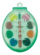 A small, oval paint set with multiple bright colors and a mini brush, labeled "World’s Smallest Paint Set" on a clear, translucent green case.