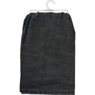 A dark gray, textured towel hangs neatly from a white hanger against a plain backdrop. The towel appears soft and is uniformly draped.