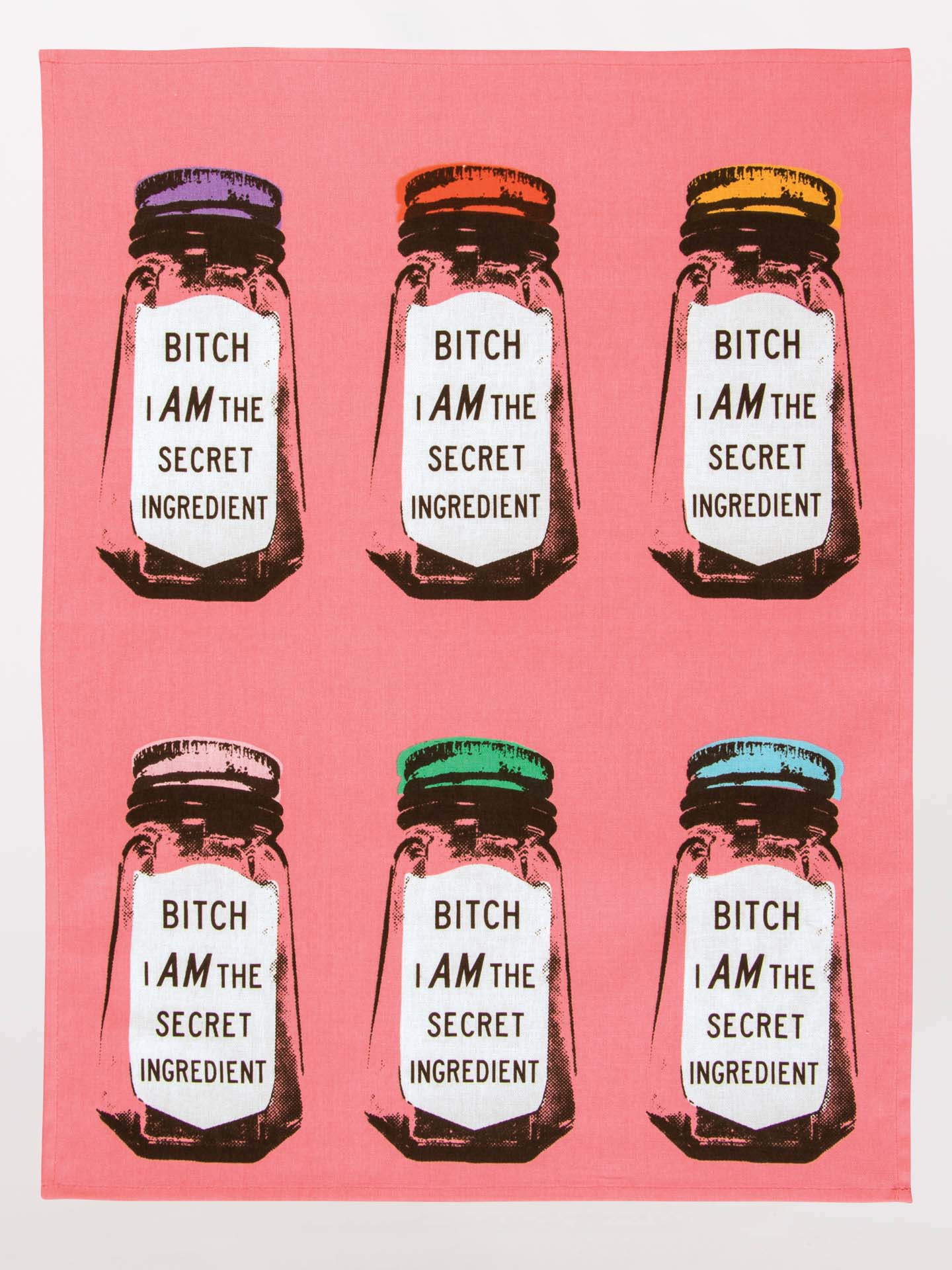 Six small bottles with colorful lids and labels on a pink background