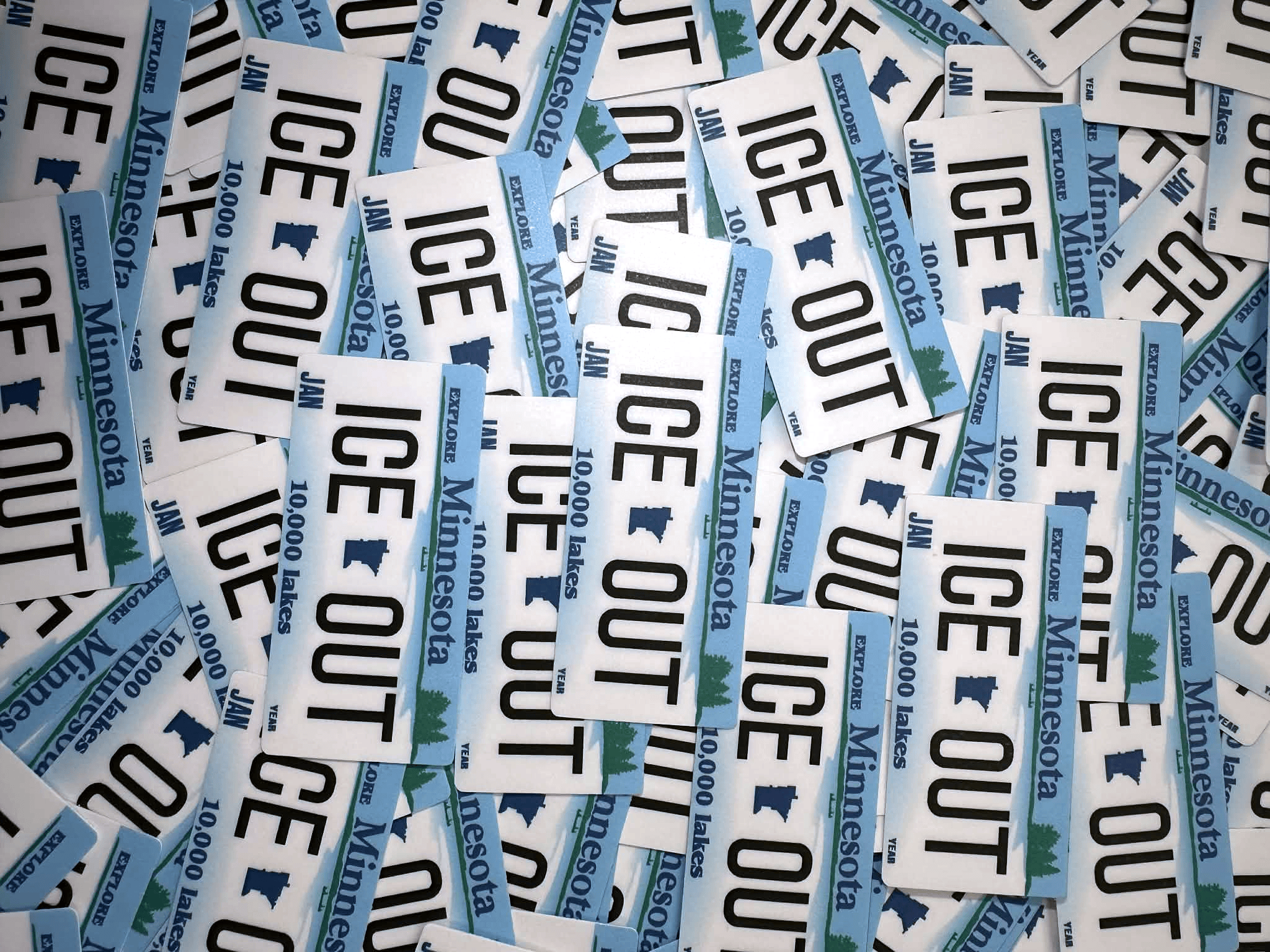 Multiple 'Ice Out'Minnesota fishing licenses stacked together