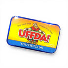 Mint tin with colorful label featuring cartoon character and text “U Betcha!” on a white background