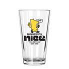Clear glass featuring a yellow Minnesota shape cartoon with a smiling face, holding a drink and peace sign. Text reads "Minnesota Nice" and "You Betcha" Est. 1858.