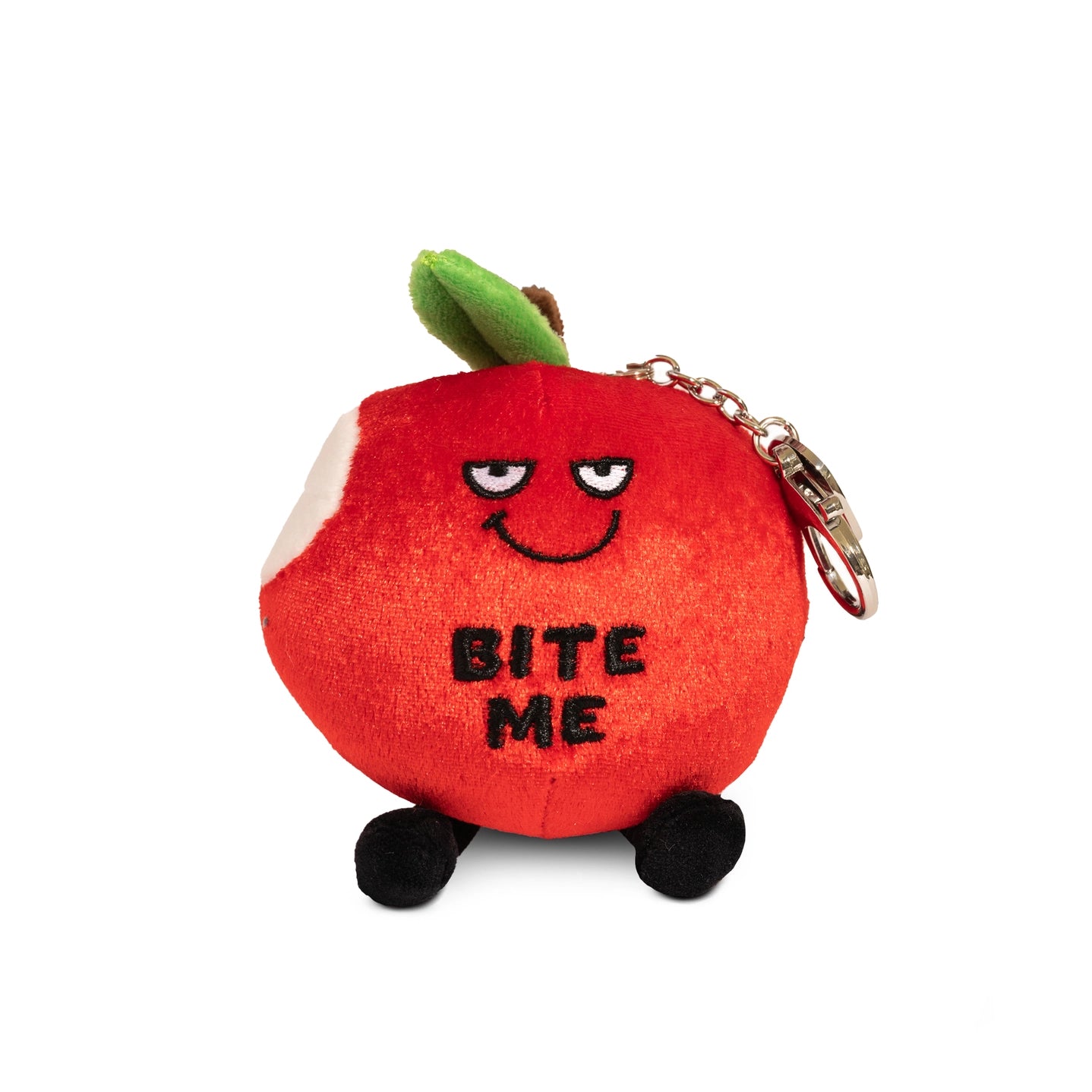 A plush bag charm shaped like a red apple with a playful, mischievous expression. One side features a bite mark, adding to its cheeky design. The plush has small black dangling legs and a green leaf on top. Embroidered on the front are the words 'BITE ME' in bold, black letters. Attached to the plush is a silver keychain clip, making it a fun and sassy accessory for bags or backpacks.