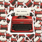 Red typewriter with 'Dear Asshole' text on a pattern of typewriters.