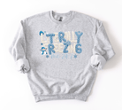 Gray sweatshirt with 'Literally Rezing Me 24/7' text and snowman graphics on a white background