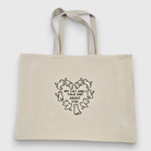 Embroidered Tote with cats around a heart shape with the words "My cat and I talk shit about you"
