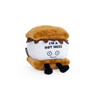 A s'more plushie featuring a smiley face, with black embroidered text that says 'I'm a hot mess.' The plushie has a layer of soft, golden-brown marshmallow, a piece of chocolate, and two graham crackers, all stitched together in a cute, playful design.