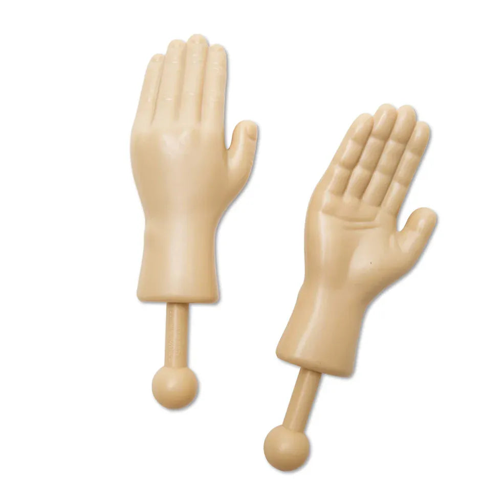 Two beige plastic toy hands with slightly bent fingers are shown, each attached to a stick with a rounded end. The background is plain white.