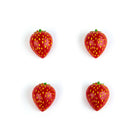 Four red strawberry-shaped objects on a white background