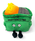 A plushie green dumpster fire with a smiley face, black embroidery that says 'i'm fine... everything is fine!' and black legs sticking out from the bottom. Yellow flames are coming out from the top."