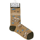 Brown sock with green heel and toe features illustrations of mushrooms and text "I'd Rather Be Foraging" in white. Playful, nature-inspired design.