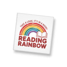 White square magnet with rainbow and book design, featuring 'Reading Rainbow' text on a white background.