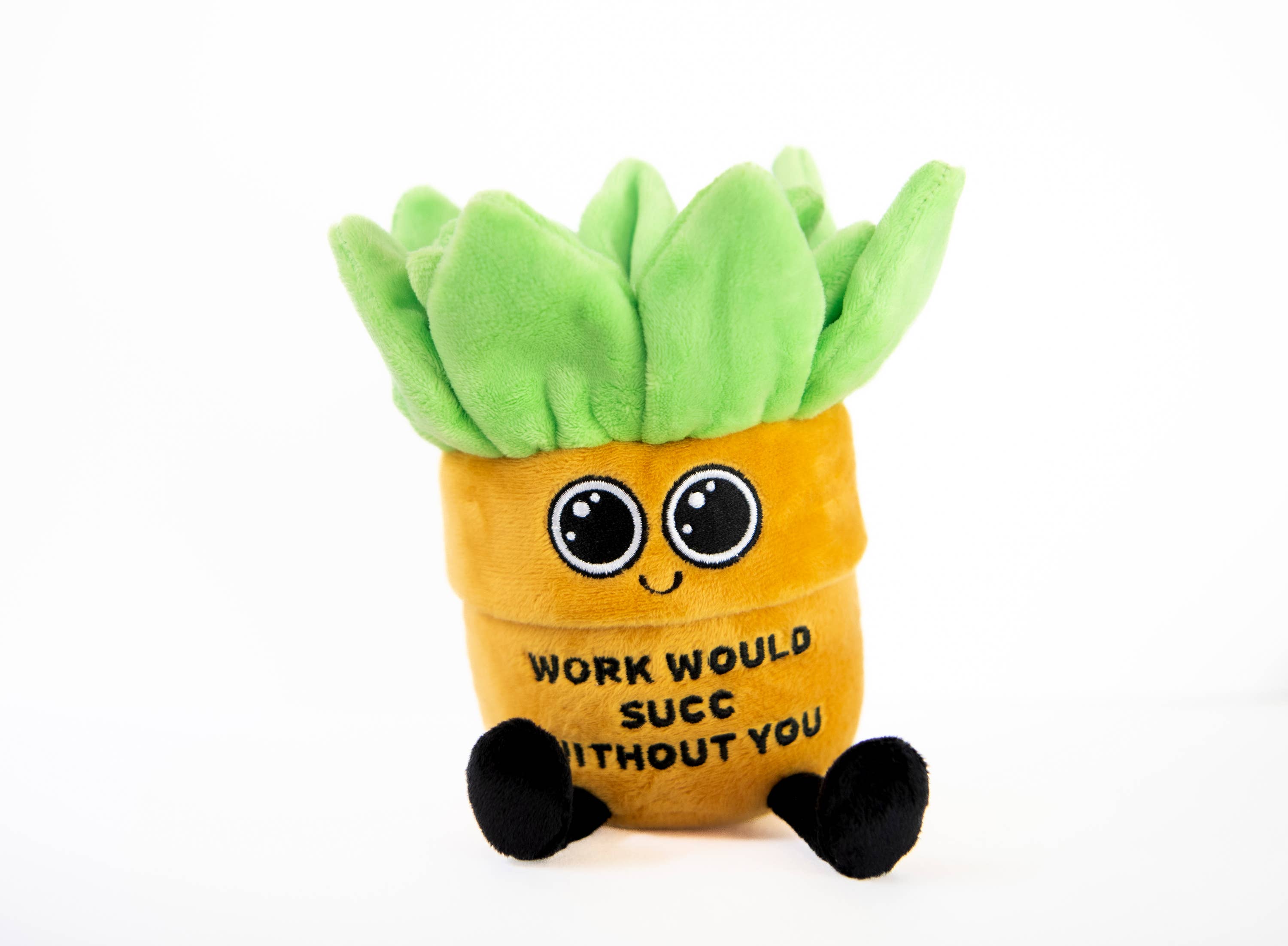 A cute plant-themed plush with a sweet expression, dangly legs, and 3D leaf details. It features a playful message about appreciating a work bestie, making it a fun and thoughtful gift. Compact and huggable in size.